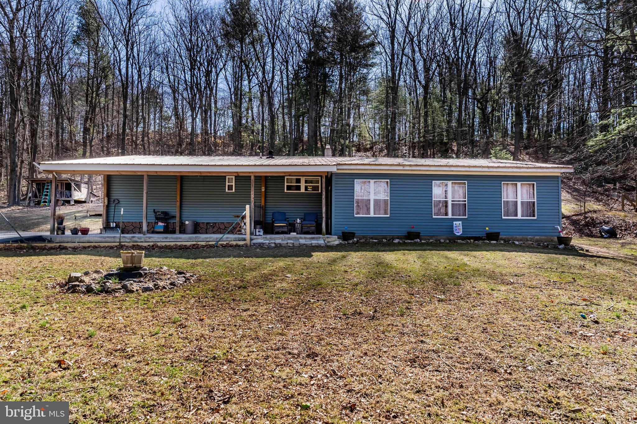 295 Greenbriar Road Elliottsburg, PA 17024 - Photo 1 of 25 front view of a house with a yard