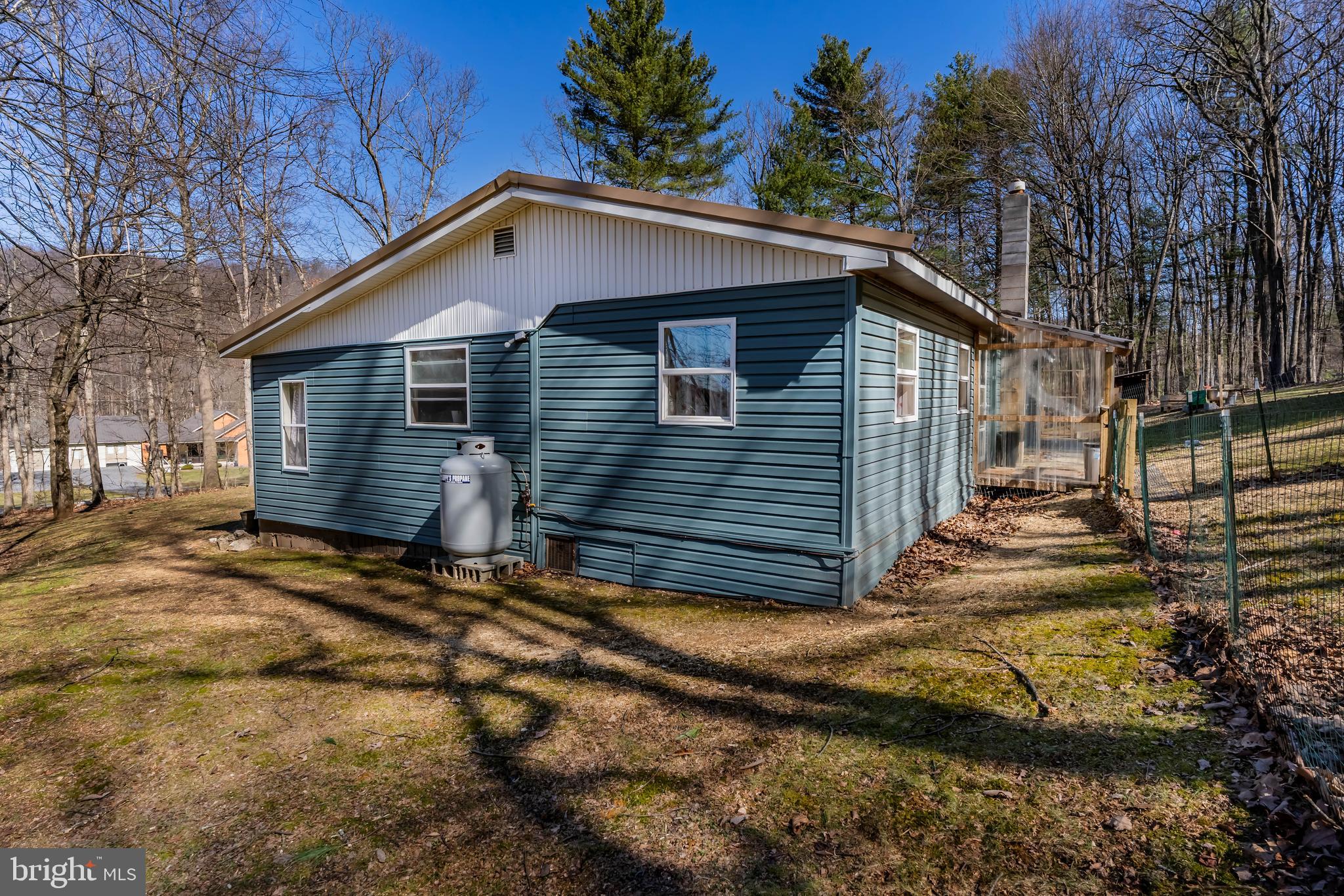 295 Greenbriar Road Elliottsburg, PA 17024 - Photo 21 of 25 a view of a house with a yard