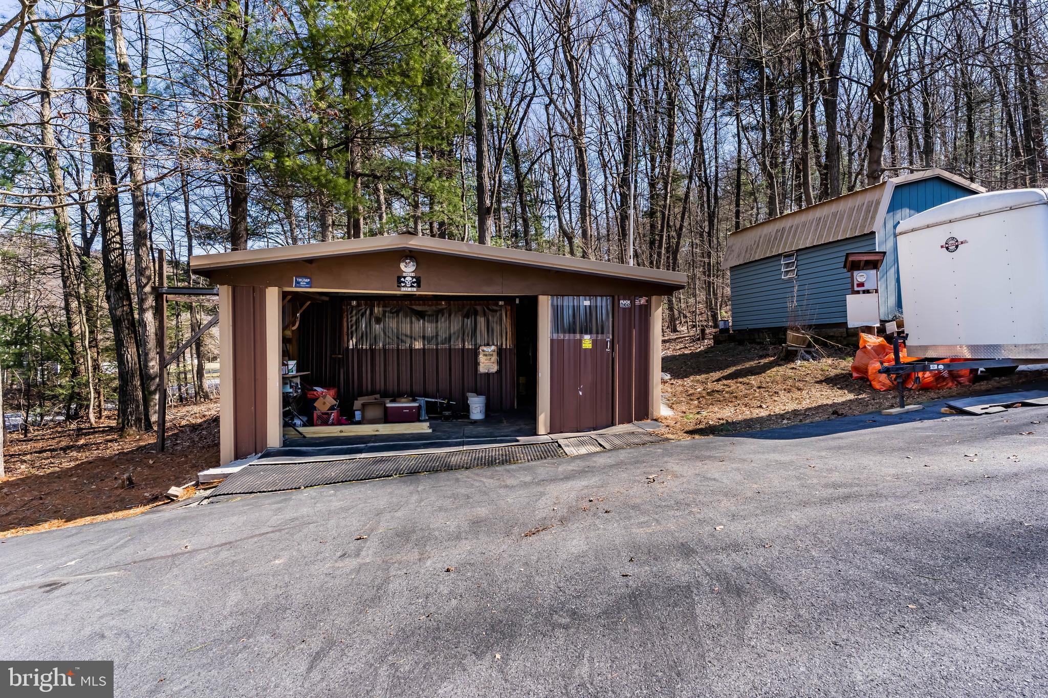 295 Greenbriar Road Elliottsburg, PA 17024 - Photo 22 of 25 a view of car parked in front of house