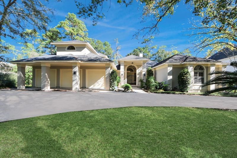 169 Grogans Point Road The Woodlands, TX 77380 - Photo 1 of 46 Welcome to 169 Grogans Point Road! This custom home was built by John Post. Notice the freshly painted exterior!