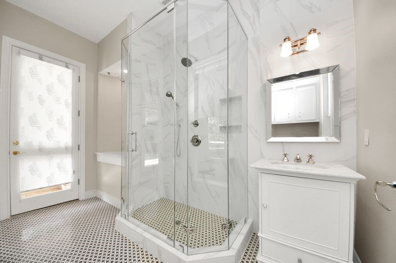 169 Grogans Point Road The Woodlands, TX 77380 - Photo 29 of 46 Pool bath with a door leading to the courtyard pool.