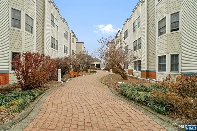 a view of a building with a yard