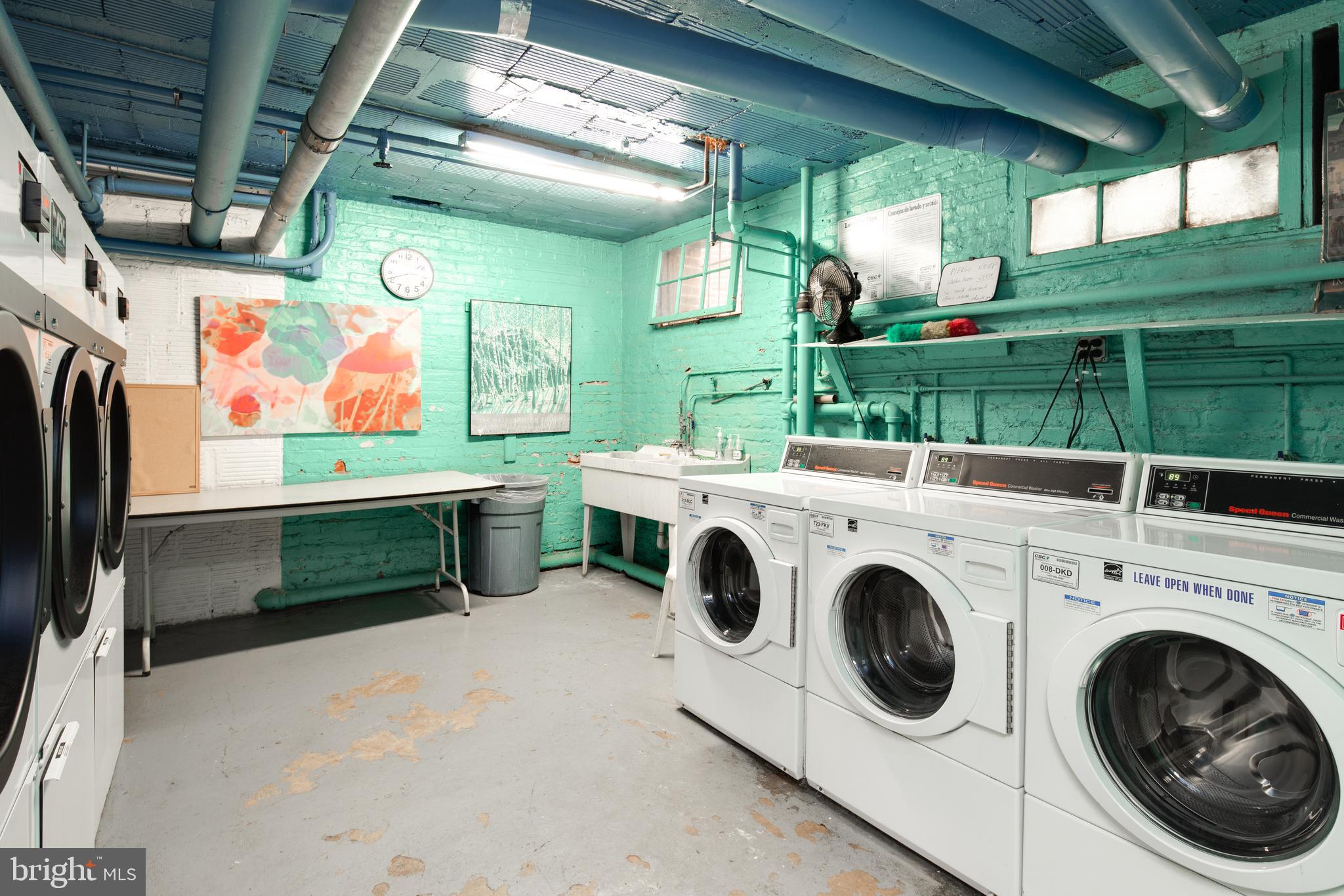 2707 Adams Mill Road Northwest, Unit 303 Washington, DC 20009 - Photo 27 of 30 a utility room with dryer and washer