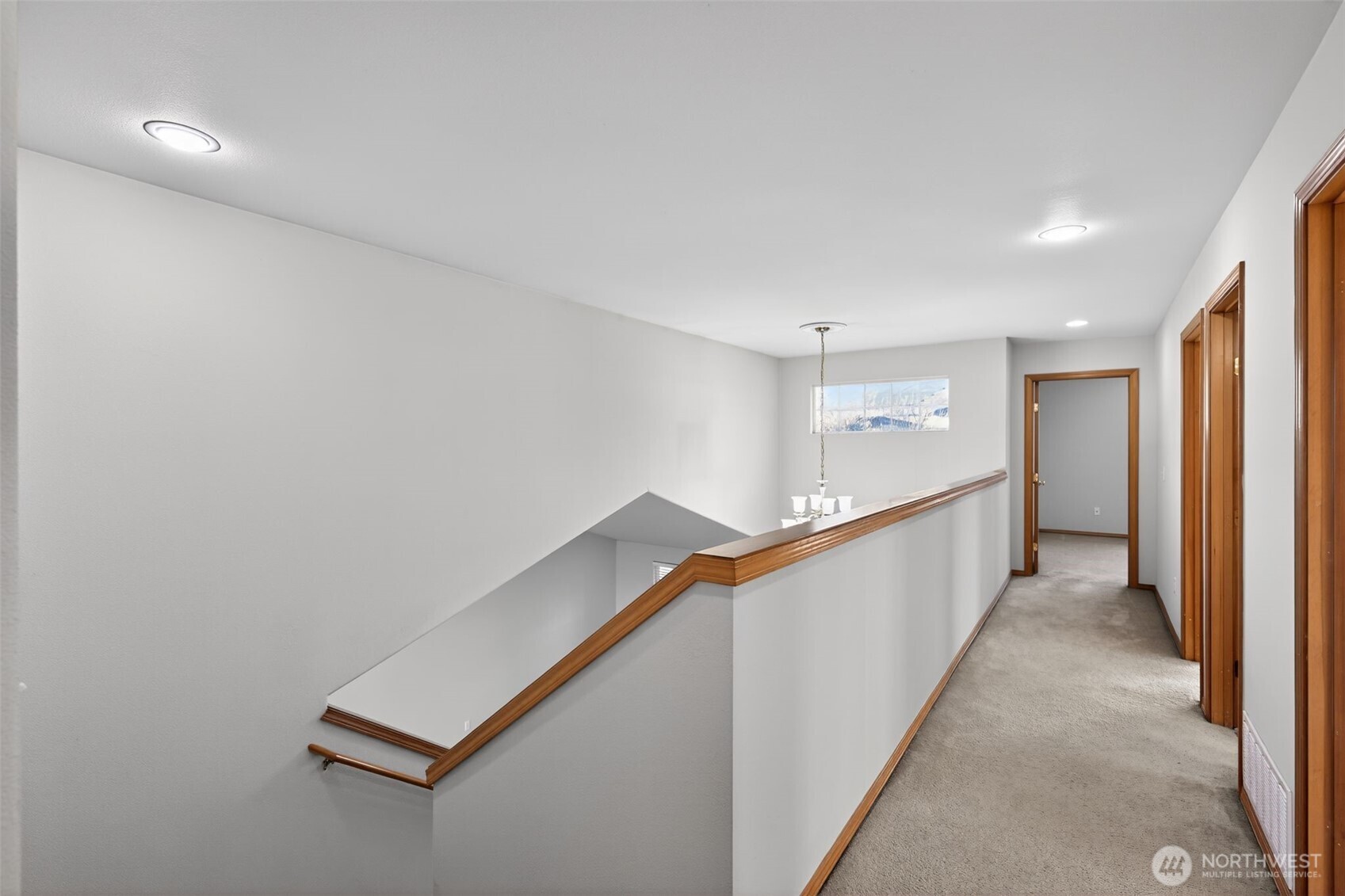 2103 Northeast 6th Circle Renton, WA 98056 - Photo 16 of 38 a view of a hallway with stairs