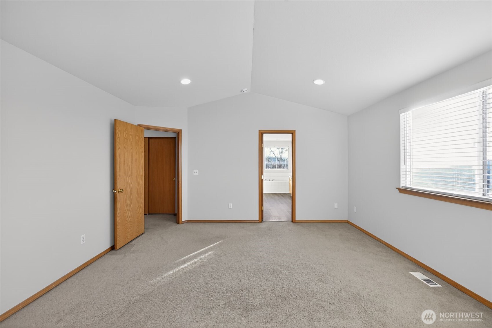 2103 Northeast 6th Circle Renton, WA 98056 - Photo 18 of 38 a view of an empty room with a window