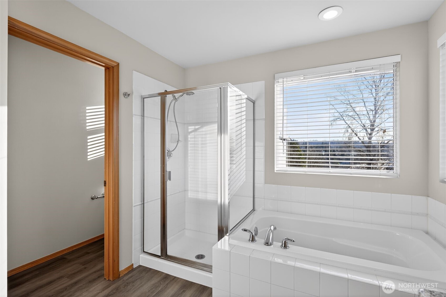 2103 Northeast 6th Circle Renton, WA 98056 - Photo 20 of 38 a bathroom with a bathtub and a shower