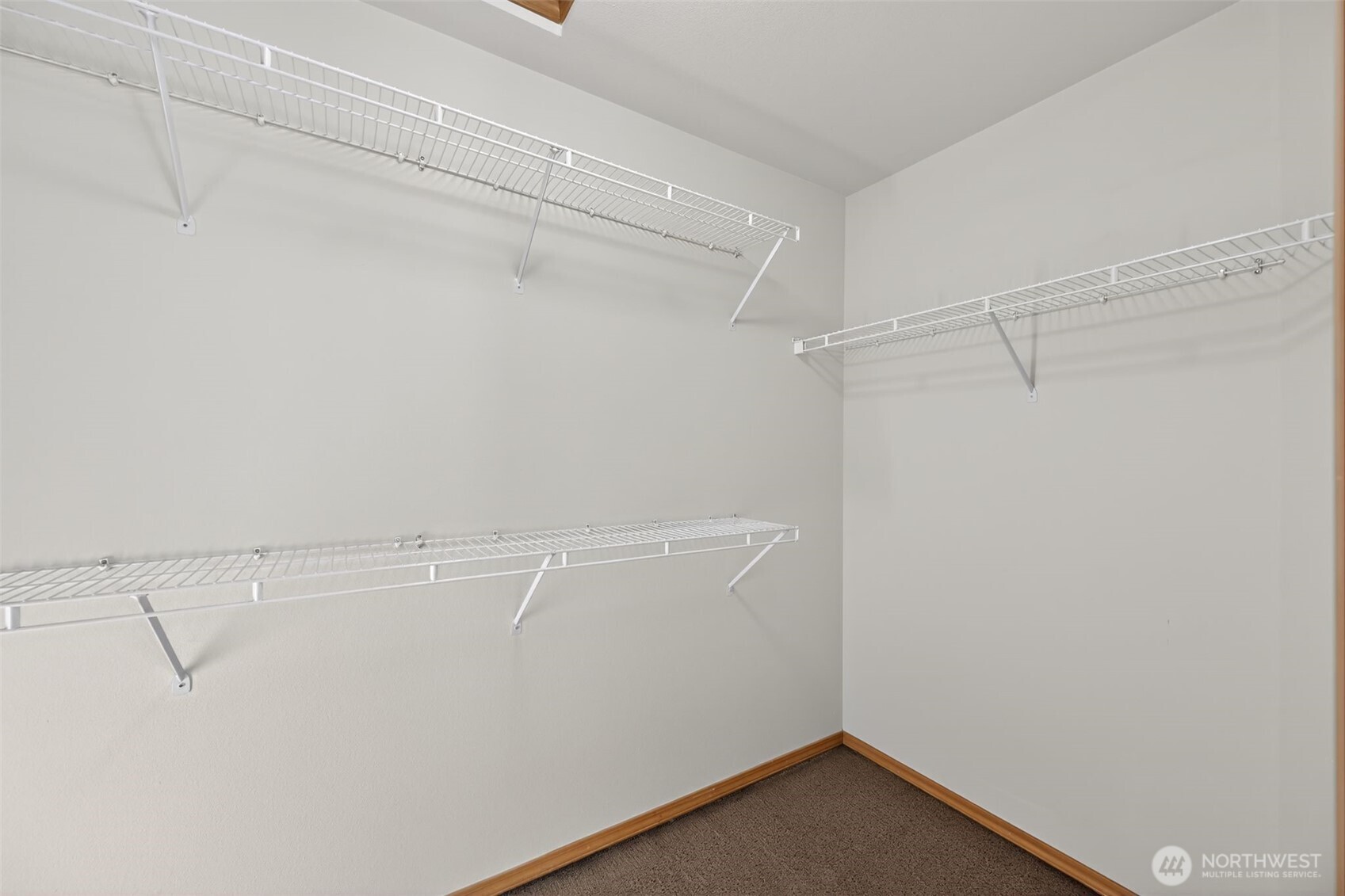 2103 Northeast 6th Circle Renton, WA 98056 - Photo 21 of 38 a view of a room with racks on the wall