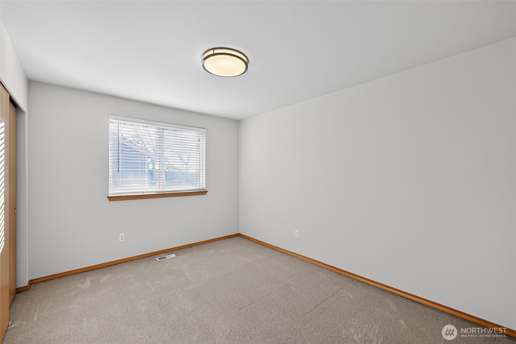 2103 Northeast 6th Circle Renton, WA 98056 - Photo 23 of 38 an empty room with windows