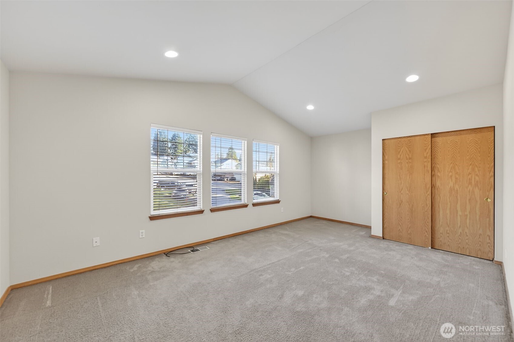2103 Northeast 6th Circle Renton, WA 98056 - Photo 24 of 38 an empty room with windows