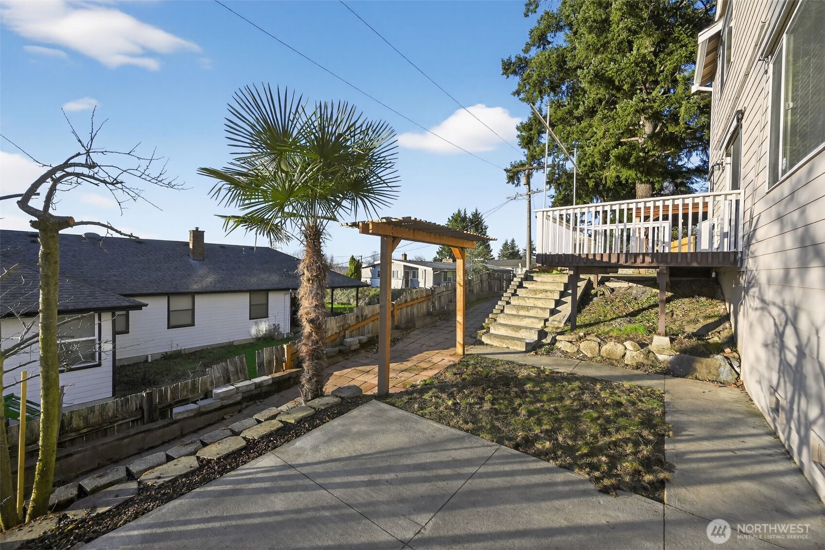 2103 Northeast 6th Circle Renton, WA 98056 - Photo 31 of 38 a front view of a house with a yard