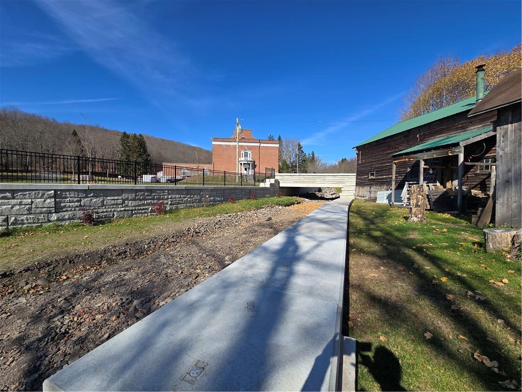 39 Delaware Avenue Andes, NY 13731 - Photo 34 of 38 Back end of the property abuts Liddle Brook which