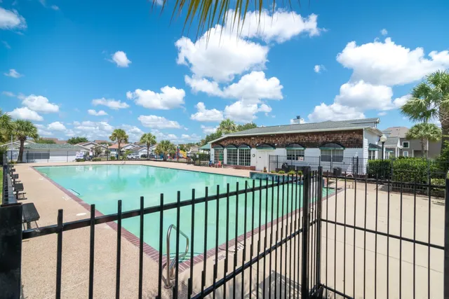 a view of a house with a swimming pool