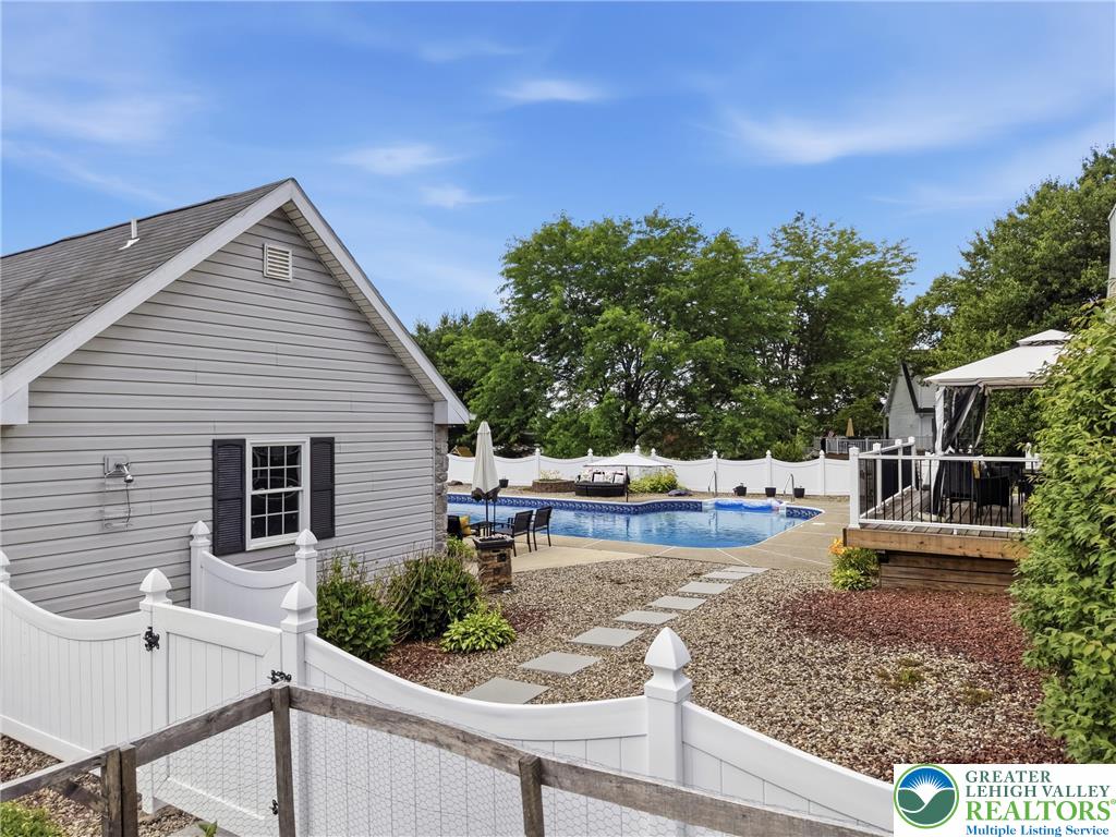 890 Lahr Road Nazareth, PA 18064 - Photo 43 of 71 An inviting pool area with a spacious deck and covered gazebo creates an ideal outdoor retreat.