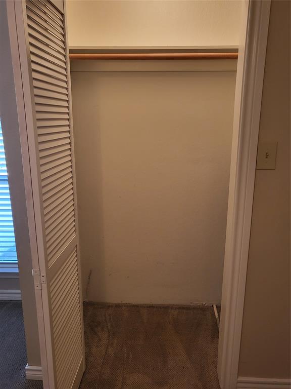 2010 Cloisters Drive, Unit 2311 Arlington, TX 76011 - Photo 16 of 24 a view of wooden door