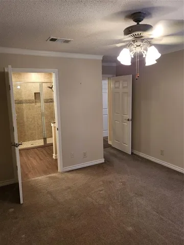 an empty room with a bathroom