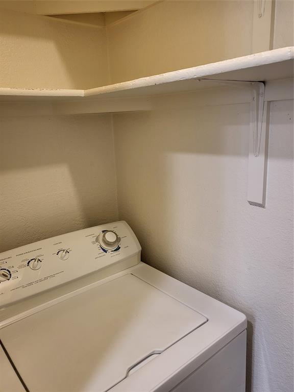 2010 Cloisters Drive, Unit 2311 Arlington, TX 76011 - Photo 10 of 24 a utility room with dryer and washer