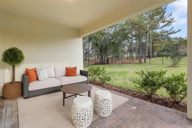 an aerial view of residential house with a yard