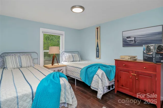 a view of a backyard with sitting area