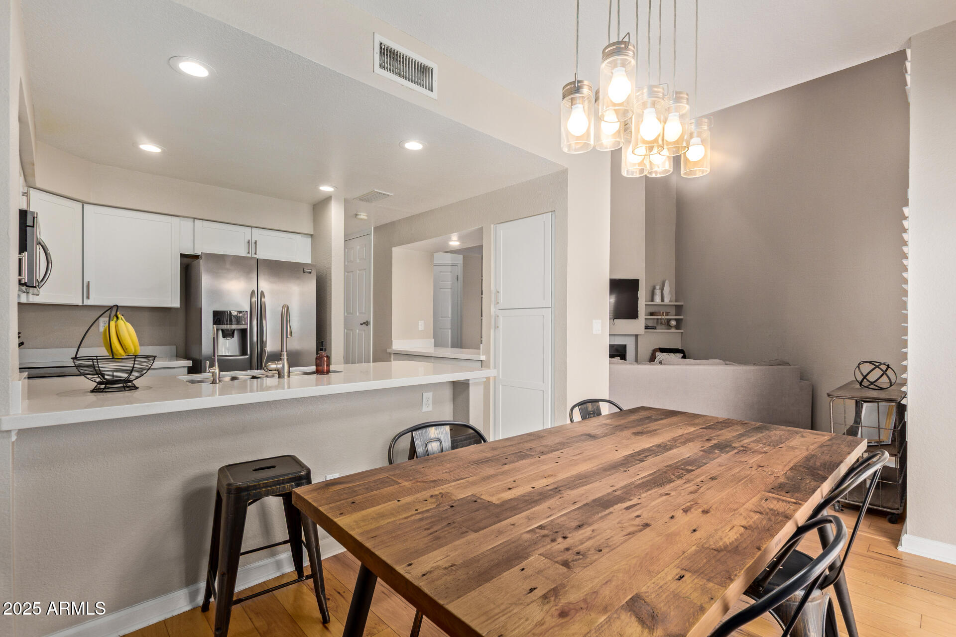7716 South Rita Lane Tempe, AZ 85284 - Photo 11 of 31 a kitchen with a table and chairs in it