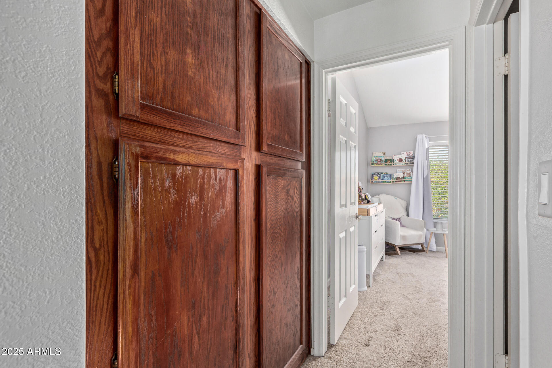 7716 South Rita Lane Tempe, AZ 85284 - Photo 22 of 31 a view of a hallway with toilet and tub