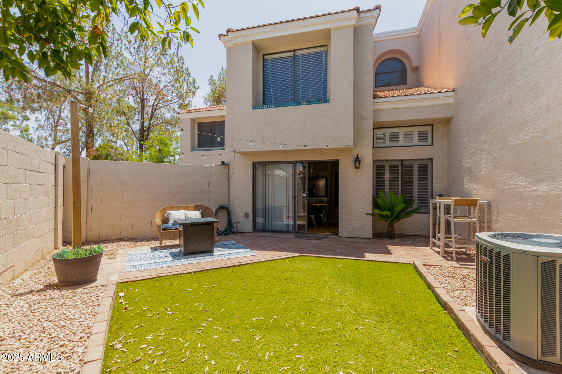 7716 South Rita Lane Tempe, AZ 85284 - Photo 25 of 31 a swimming pool with outdoor seating and yard