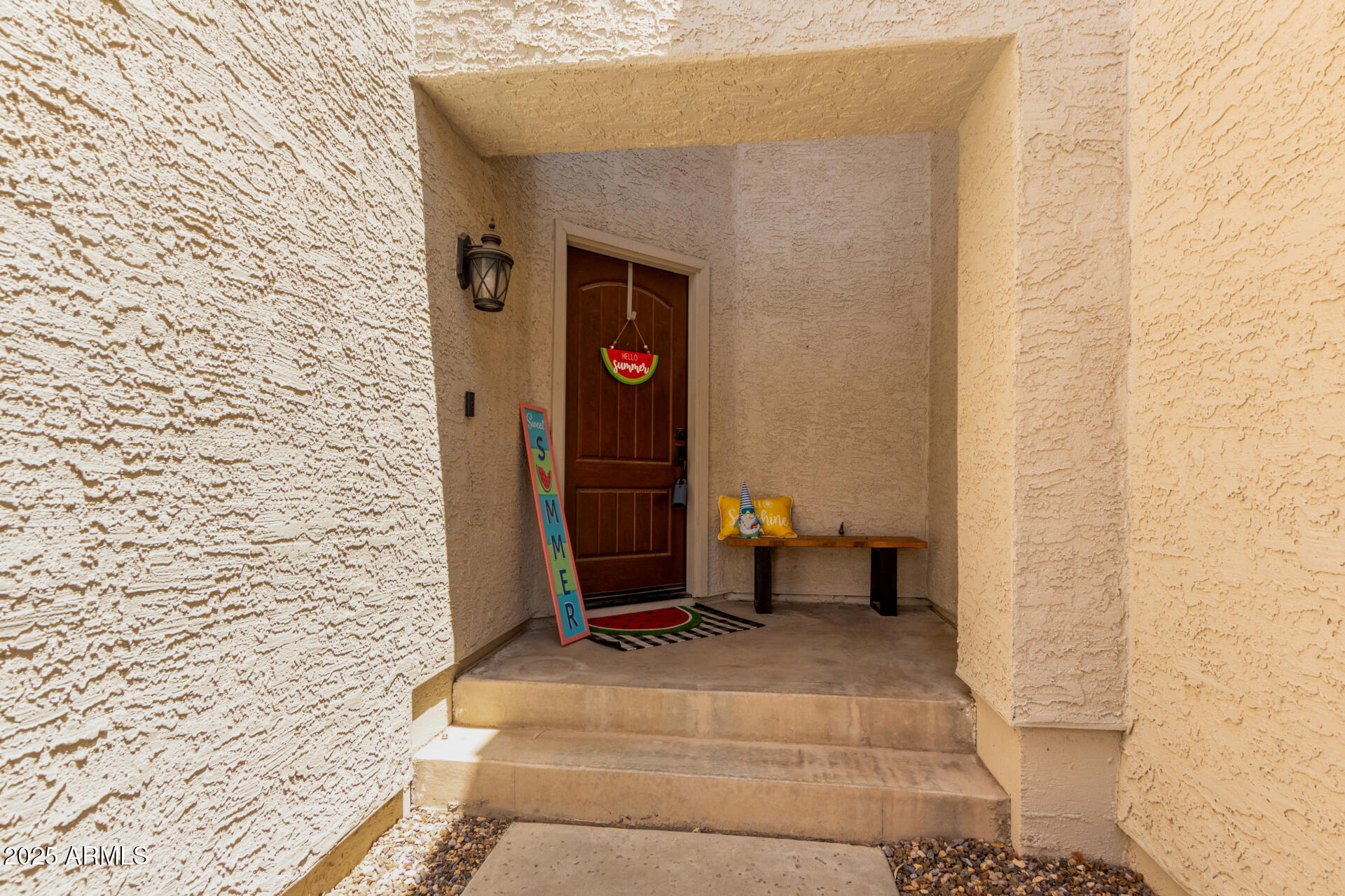 7716 South Rita Lane Tempe, AZ 85284 - Photo 5 of 31 a view of a door and chair