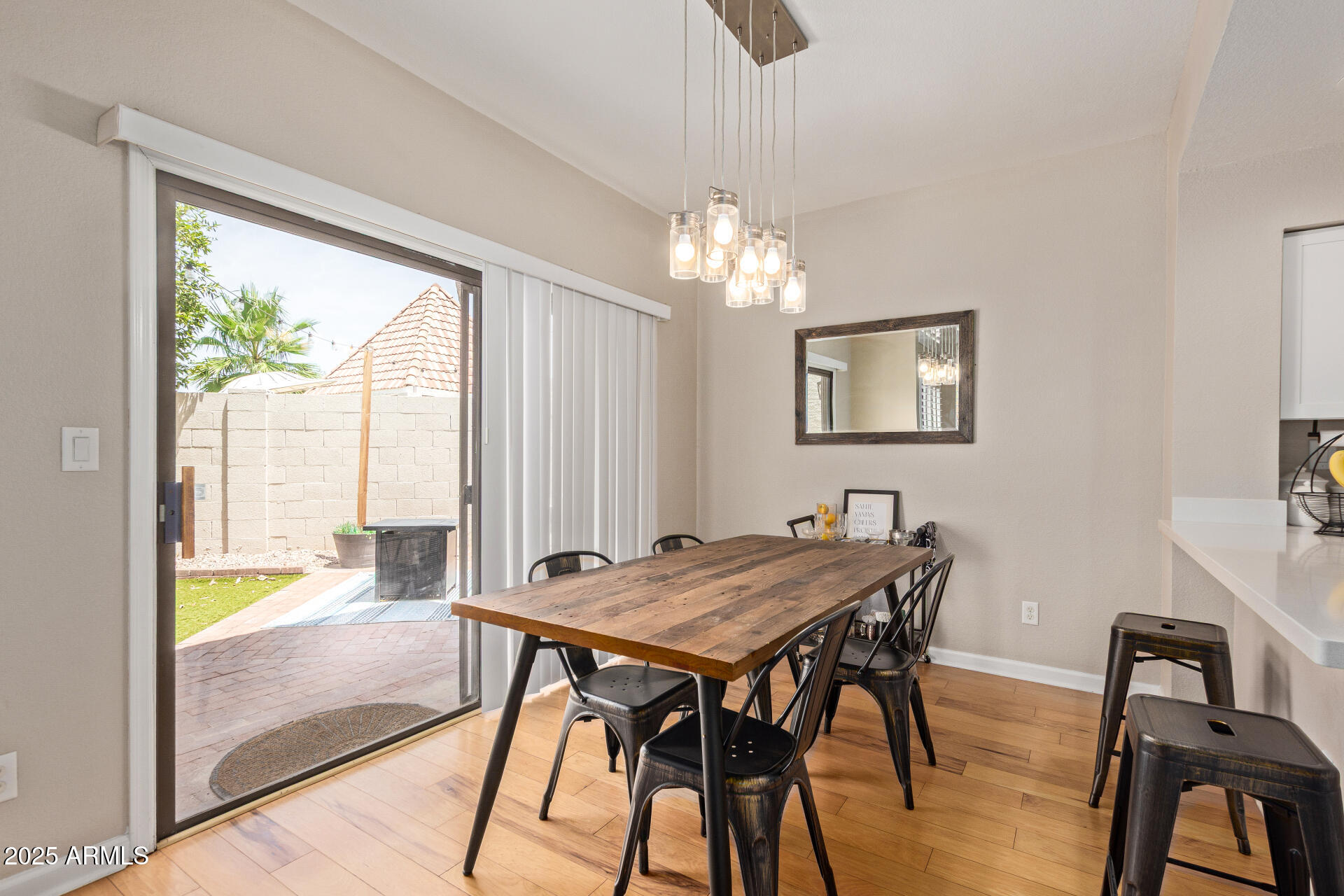 7716 South Rita Lane Tempe, AZ 85284 - Photo 10 of 31 a view of a dining room with furniture window and outside view