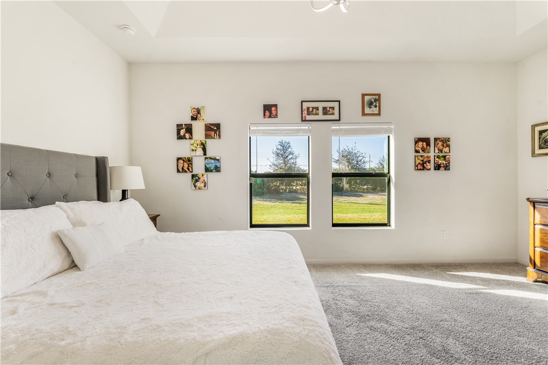 5760 1st Road Vero Beach, FL 32968 - Photo 19 of 36 a bedroom with a bed and a window