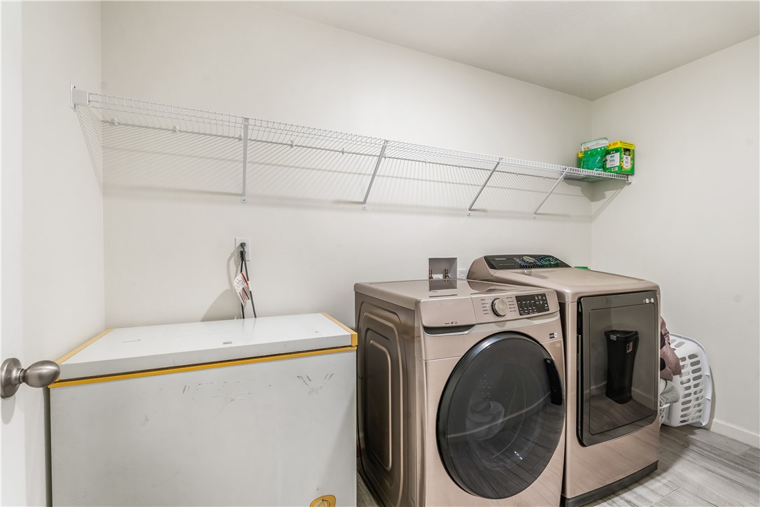 5760 1st Road Vero Beach, FL 32968 - Photo 30 of 36 a utility room with dryer and washer