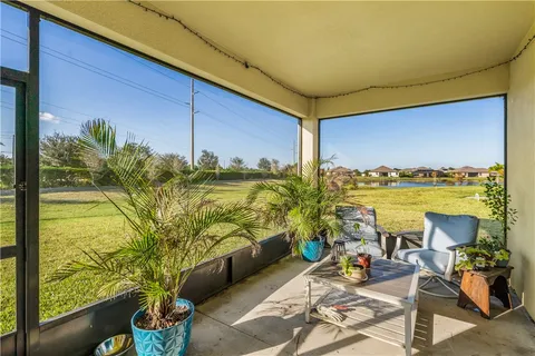 a view of a backyard of the house