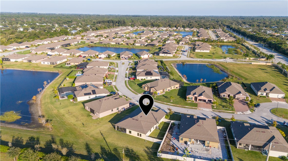 5760 1st Road Vero Beach, FL 32968 - Photo 5 of 36 an aerial view of residential houses with outdoor space