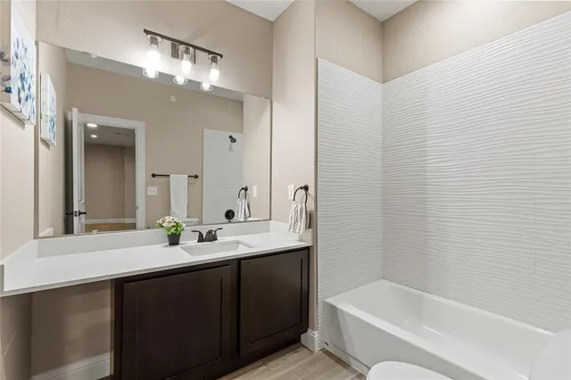 a bathroom with a sink and a toilet