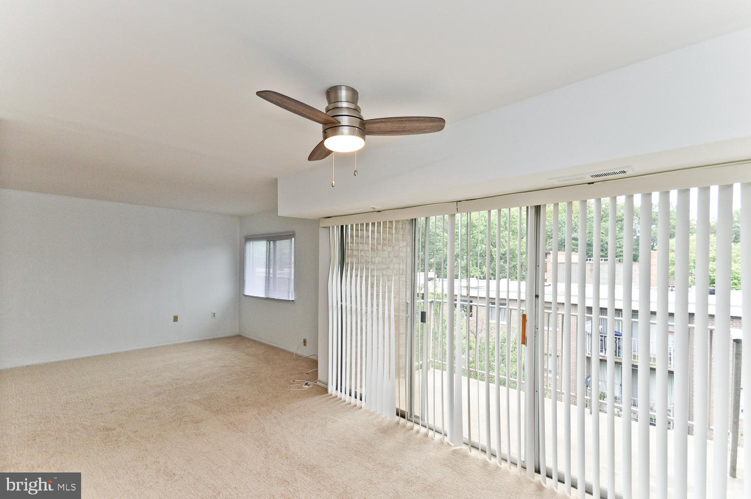 3840 Bel Pre Road, Unit 14 Silver Spring, MD 20906 - Photo 8 of 29 Living room open to Dining room