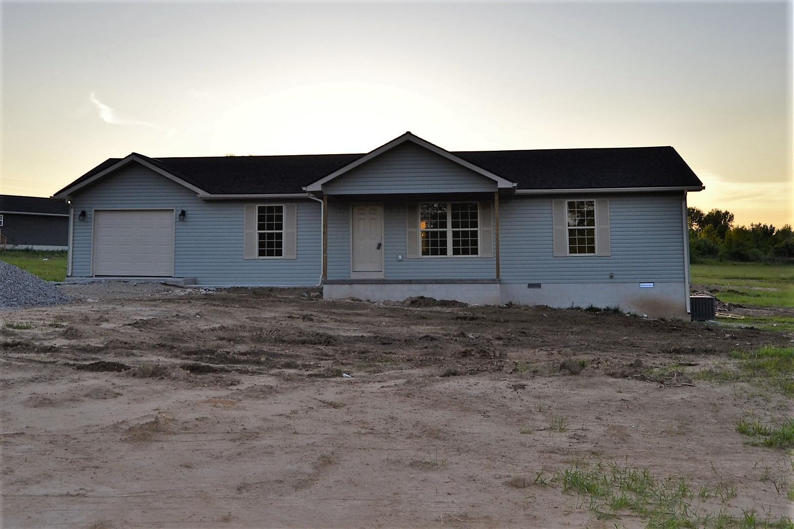 81 York Road Crossville, TN 38555 - Photo 1 of 15 a view of a house with a backyard