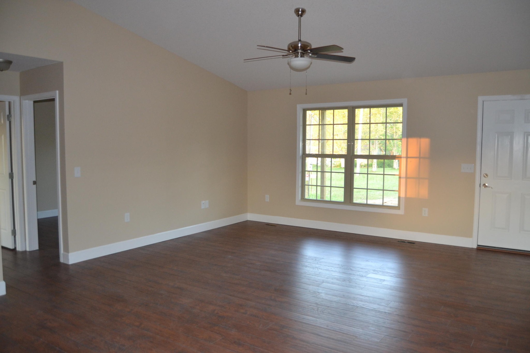 81 York Road Crossville, TN 38555 - Photo 3 of 15 a view of an empty room with wooden floor and a window