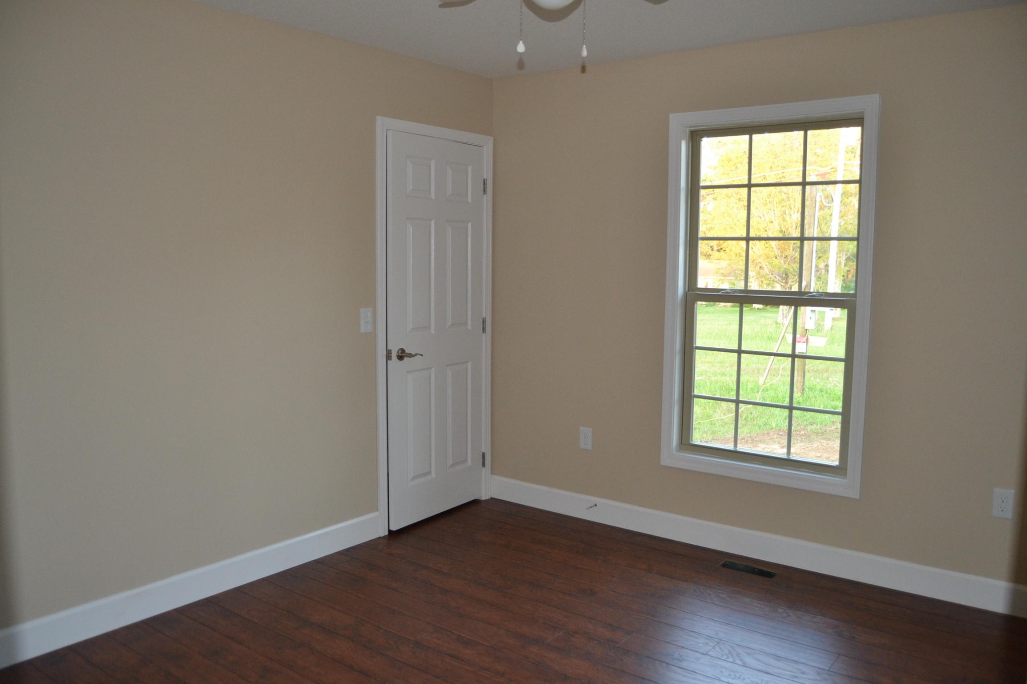 81 York Road Crossville, TN 38555 - Photo 10 of 15 an empty room with wooden floor and windows