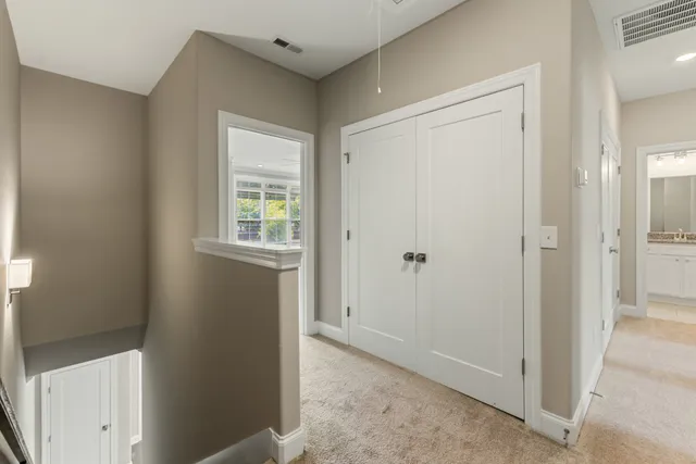 an empty room with closet area