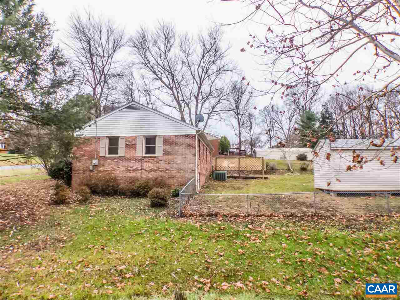 253 Locust Lane Ruckersville, VA 22968 - Photo 33 of 38 a backyard of a house with table and chairs