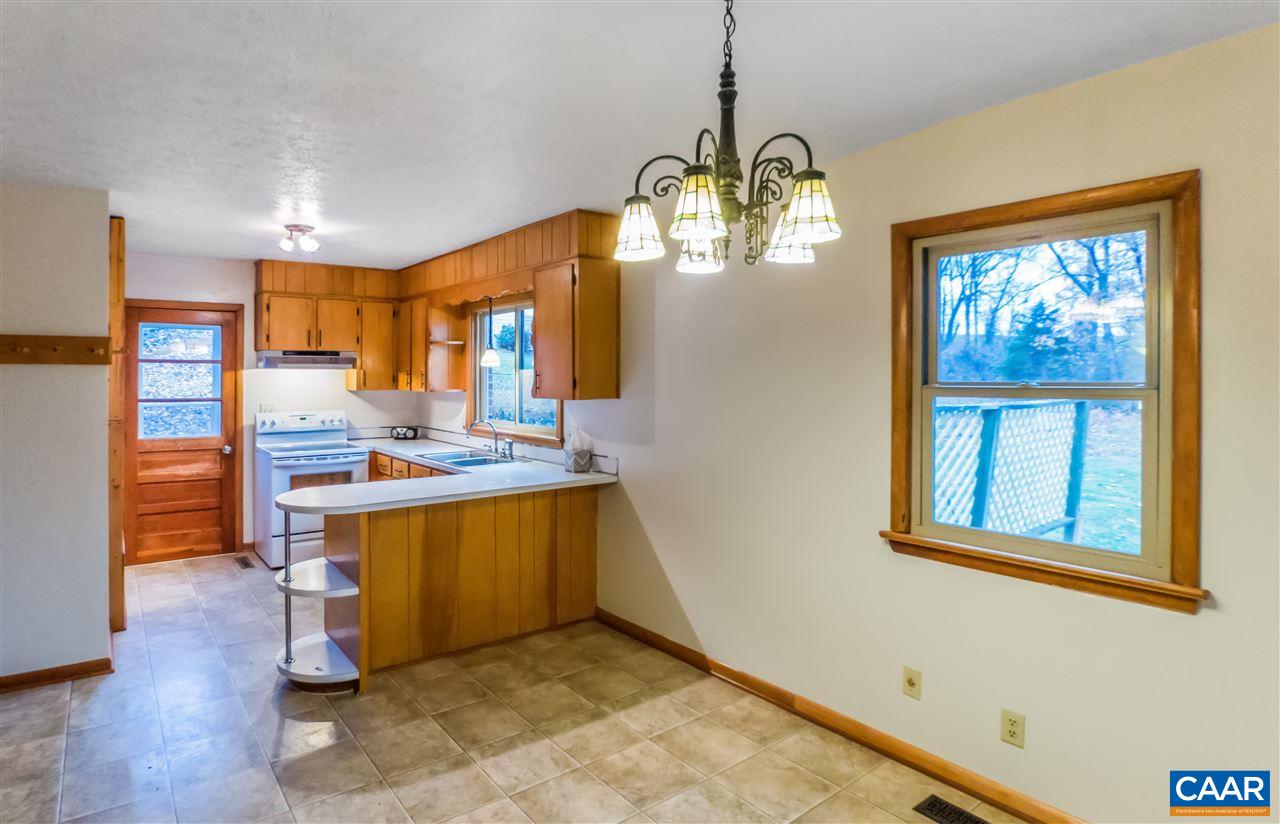 253 Locust Lane Ruckersville, VA 22968 - Photo 4 of 38 a view of a kitchen with a sink and dishwasher or wooden floor