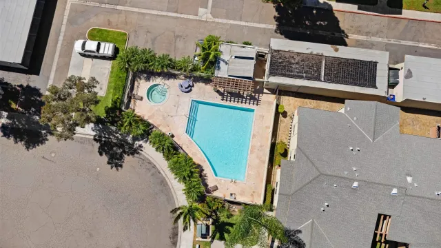 swimming pool view with a outdoor seating space