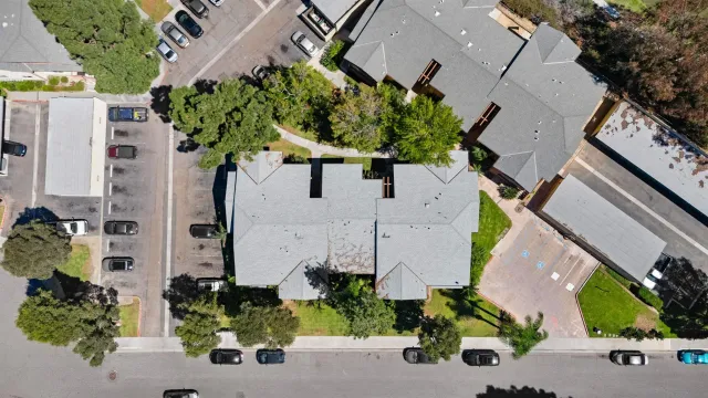 an aerial view of a house with a garden