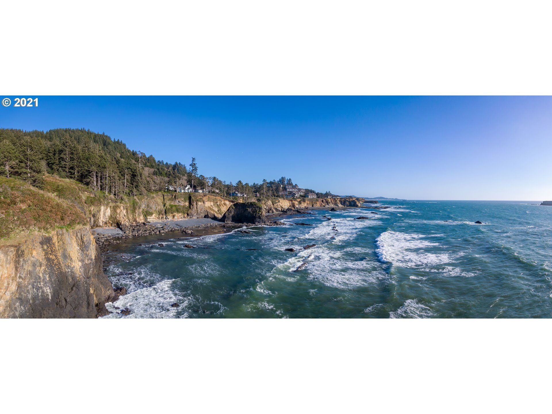 Otter Crest Loop, Unit 401 Depoe Bay, OR 97341 - Photo 2 of 7 a view of a yard with ocean view