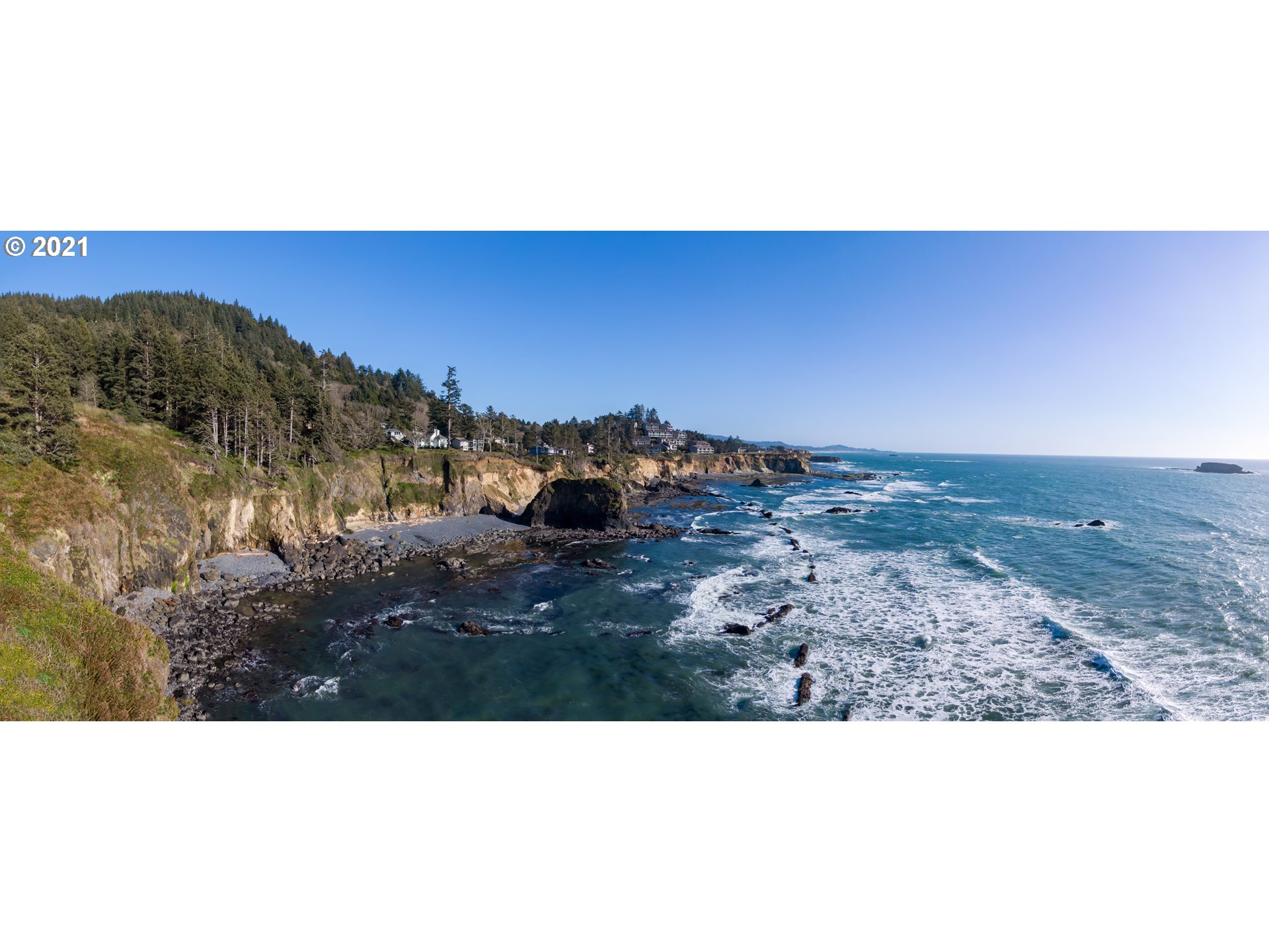 Otter Crest Loop, Unit 401 Depoe Bay, OR 97341 - Photo 7 of 7 a black and white photo of a field