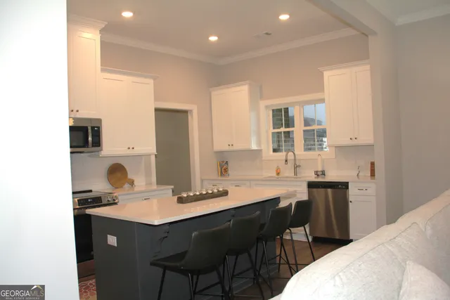 a living room with furniture and a couch