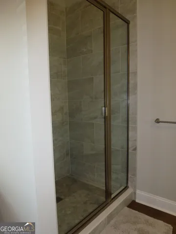 a bathroom with a sink a mirror and a toilet