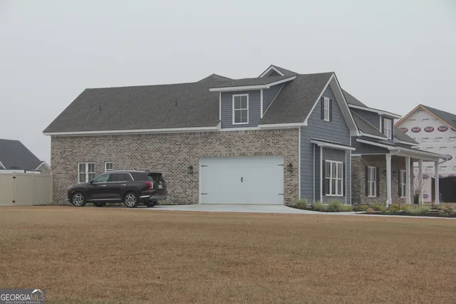 a kitchen with a stove microwave and refrigerator