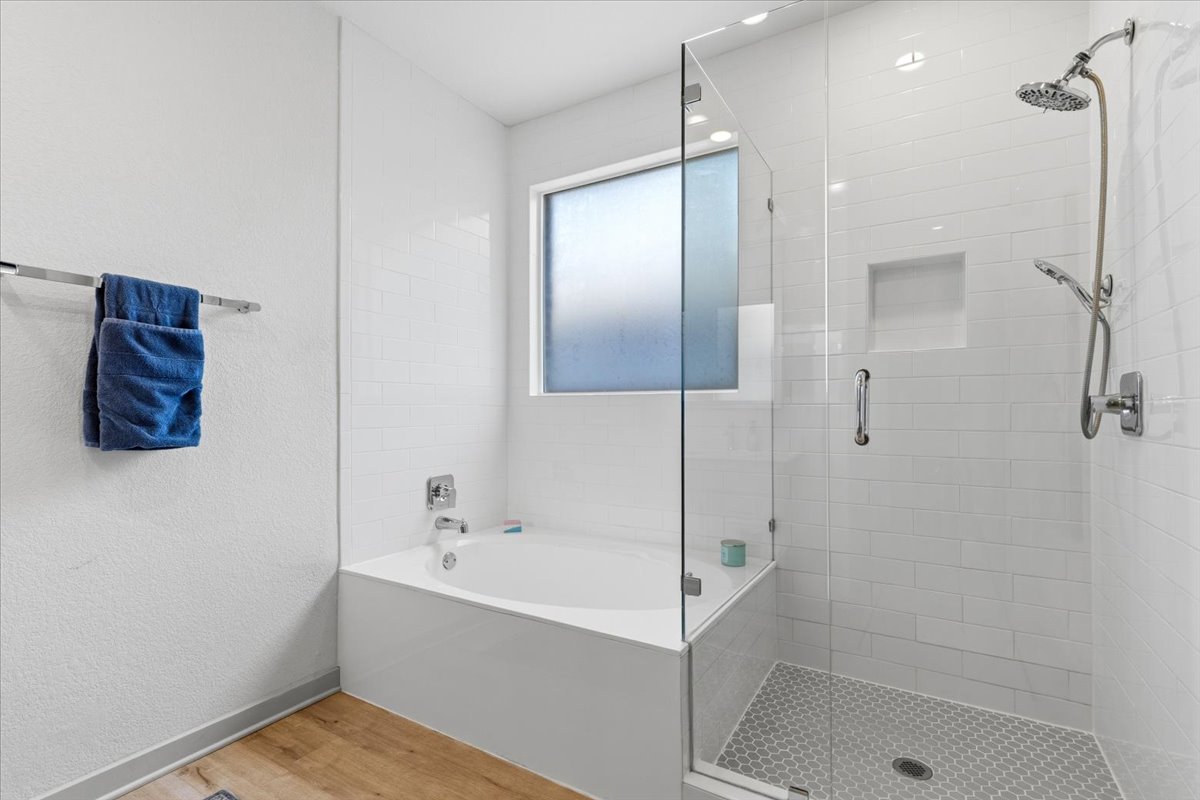 2117 Centerline Lane Georgetown, TX 78628 - Photo 21 of 31 a bathroom with a bathtub and a shower