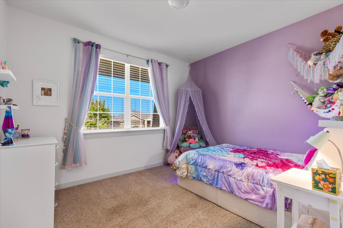 2117 Centerline Lane Georgetown, TX 78628 - Photo 25 of 31 a bedroom with a bed and a window