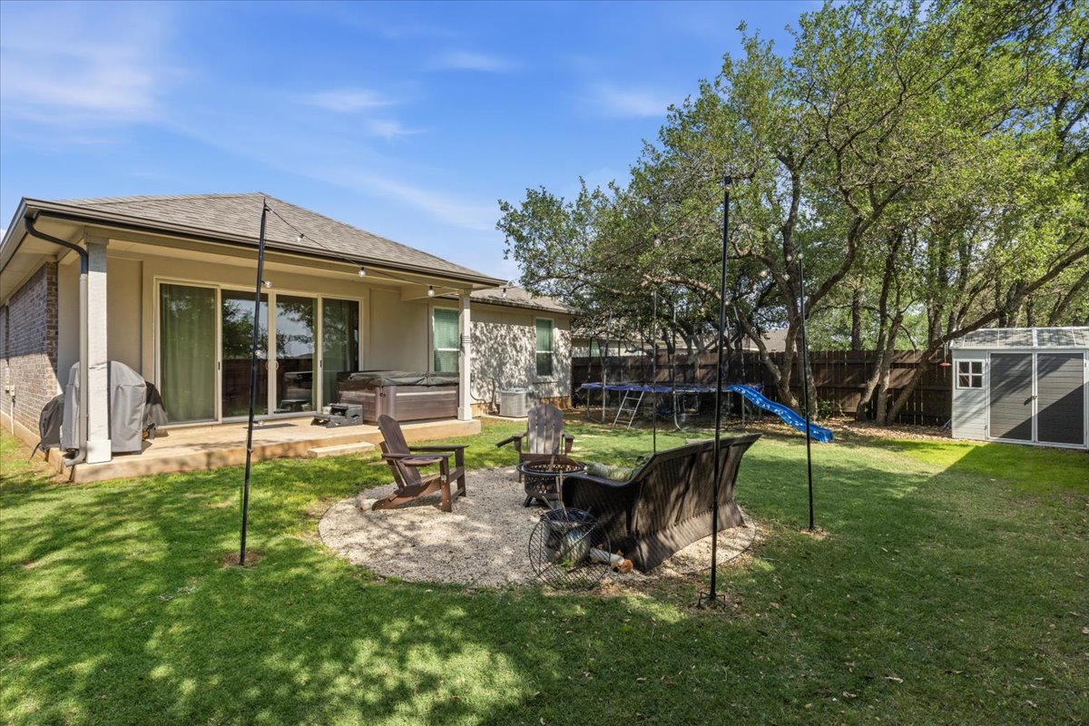 2117 Centerline Lane Georgetown, TX 78628 - Photo 28 of 31 a garden view with a seating space