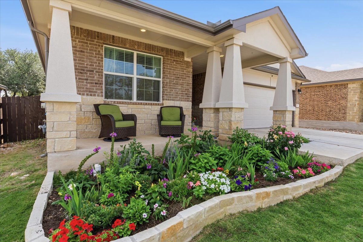 2117 Centerline Lane Georgetown, TX 78628 - Photo 5 of 31 a view of a house with backyard and garden